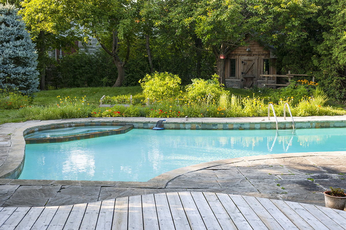 The Timeless Appeal of Natural Stone for Pool Patios - Honeysuckle