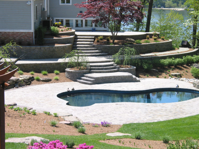 Honeysuckle Nursery & Design Natural Stone Is the Best Material for a Pool Patio